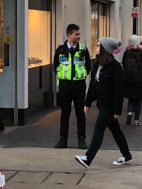 Risk Secured BID ranger on patrol in a town centre high street